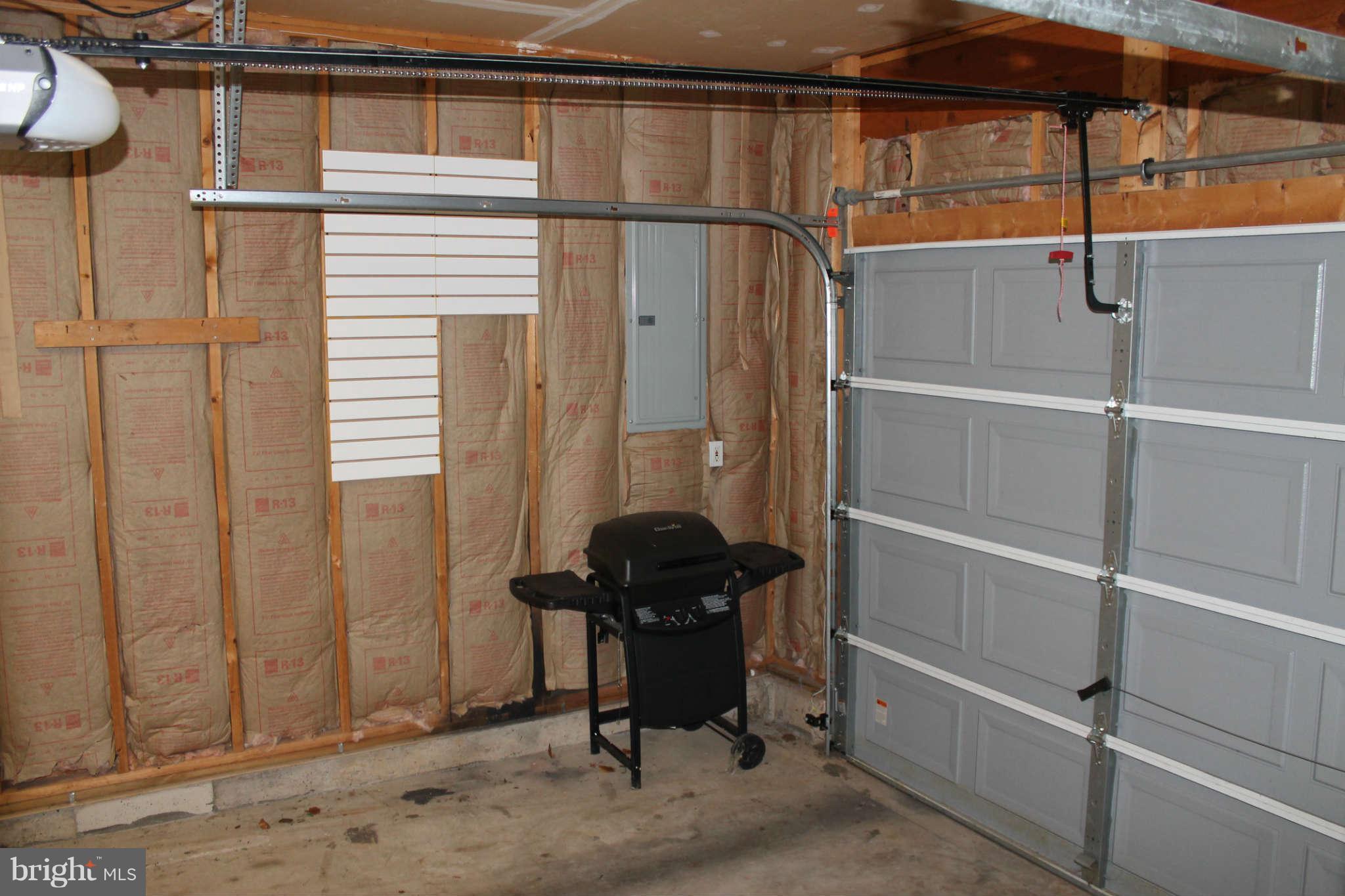 107 Estate Lane Ranson, WV 25438 - Photo 27 of 30 a view of a room with rack on the wall and a window