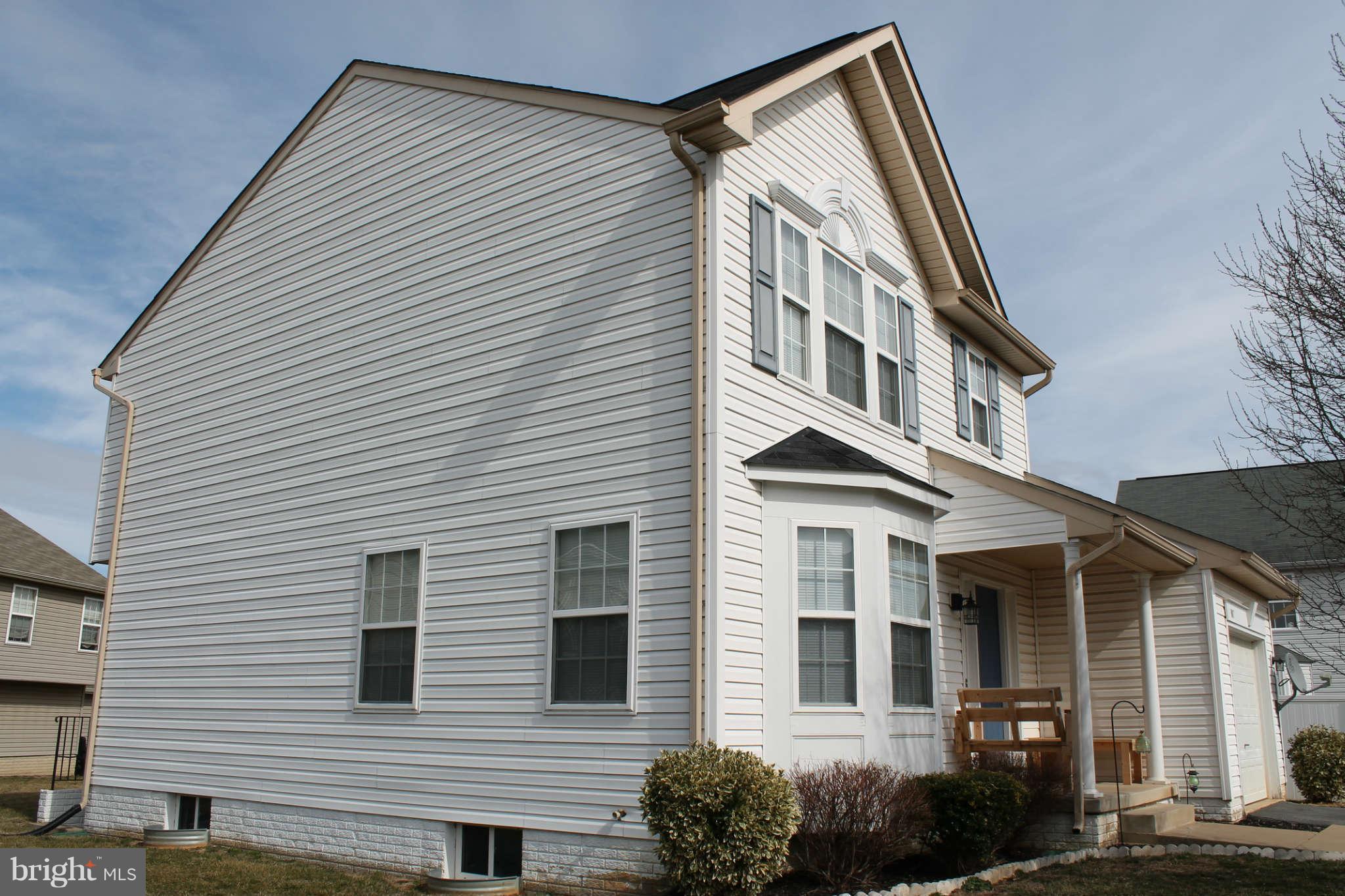 107 Estate Lane Ranson, WV 25438 - Photo 28 of 30 a view of a house that has a window and balcony