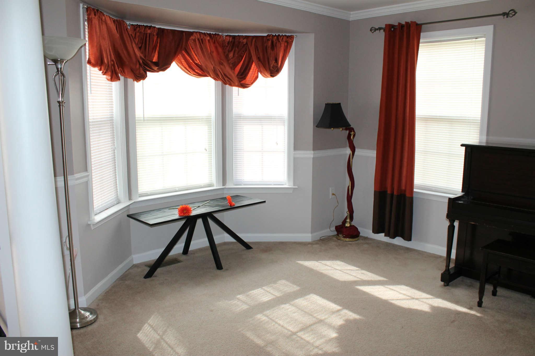 107 Estate Lane Ranson, WV 25438 - Photo 8 of 30 a view of room with window and furniture