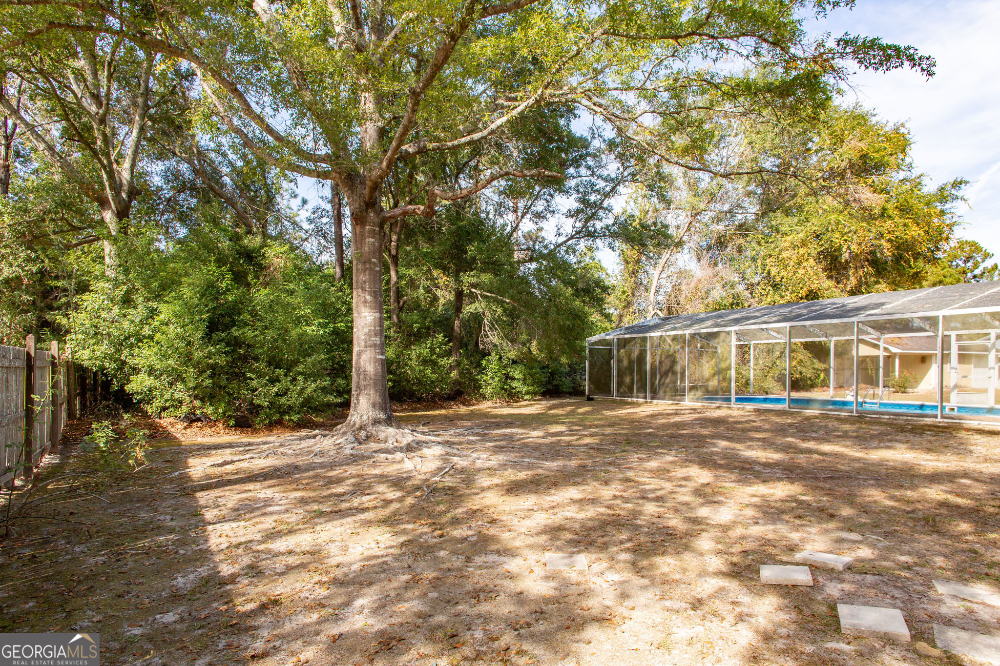 2959 Chadwick Drive Waycross, GA 31501 - Photo 12 of 52 a front view of a house with a yard and trees