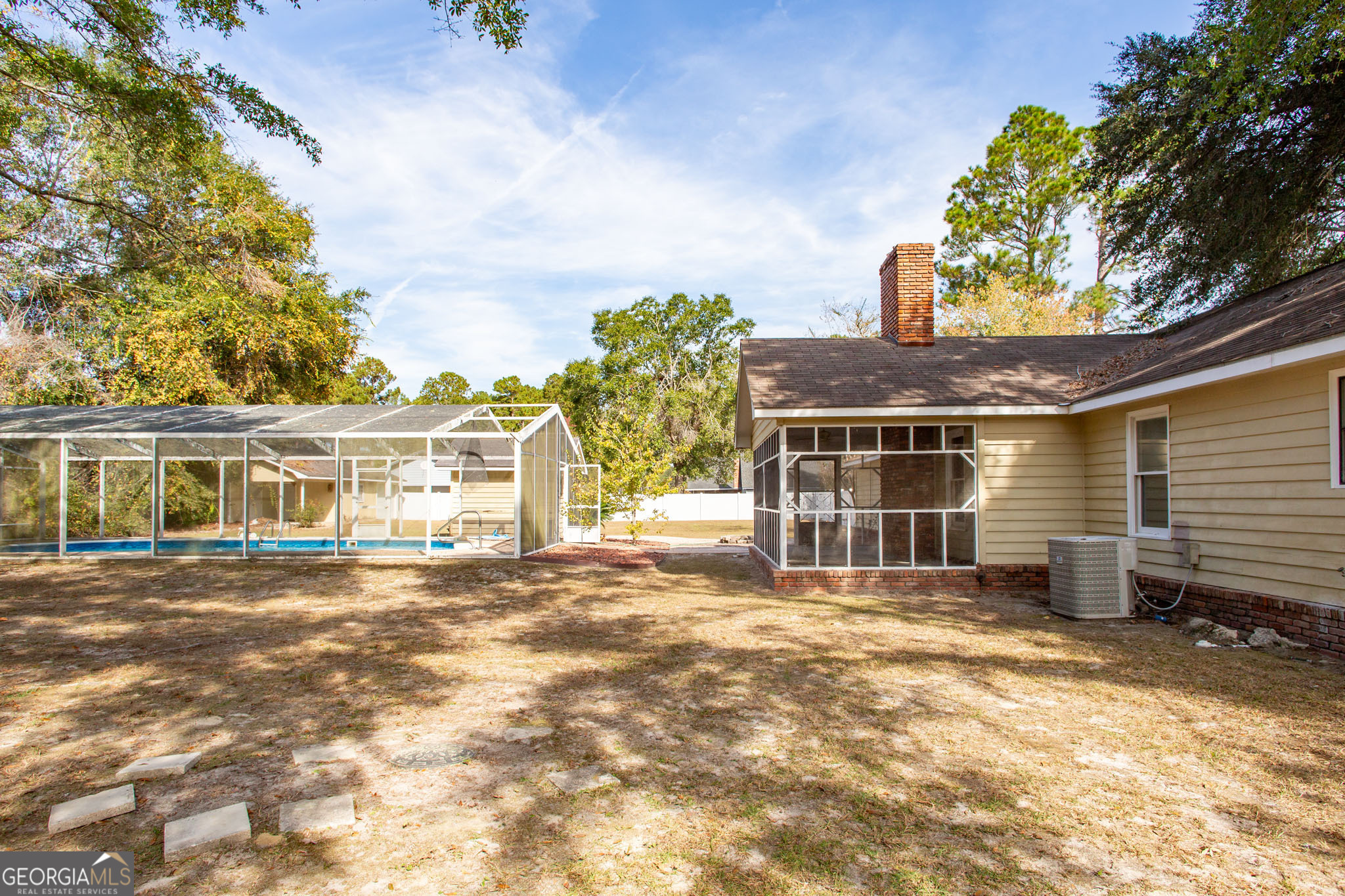 2959 Chadwick Drive Waycross, GA 31501 - Photo 13 of 52 a front view of a house with a garage
