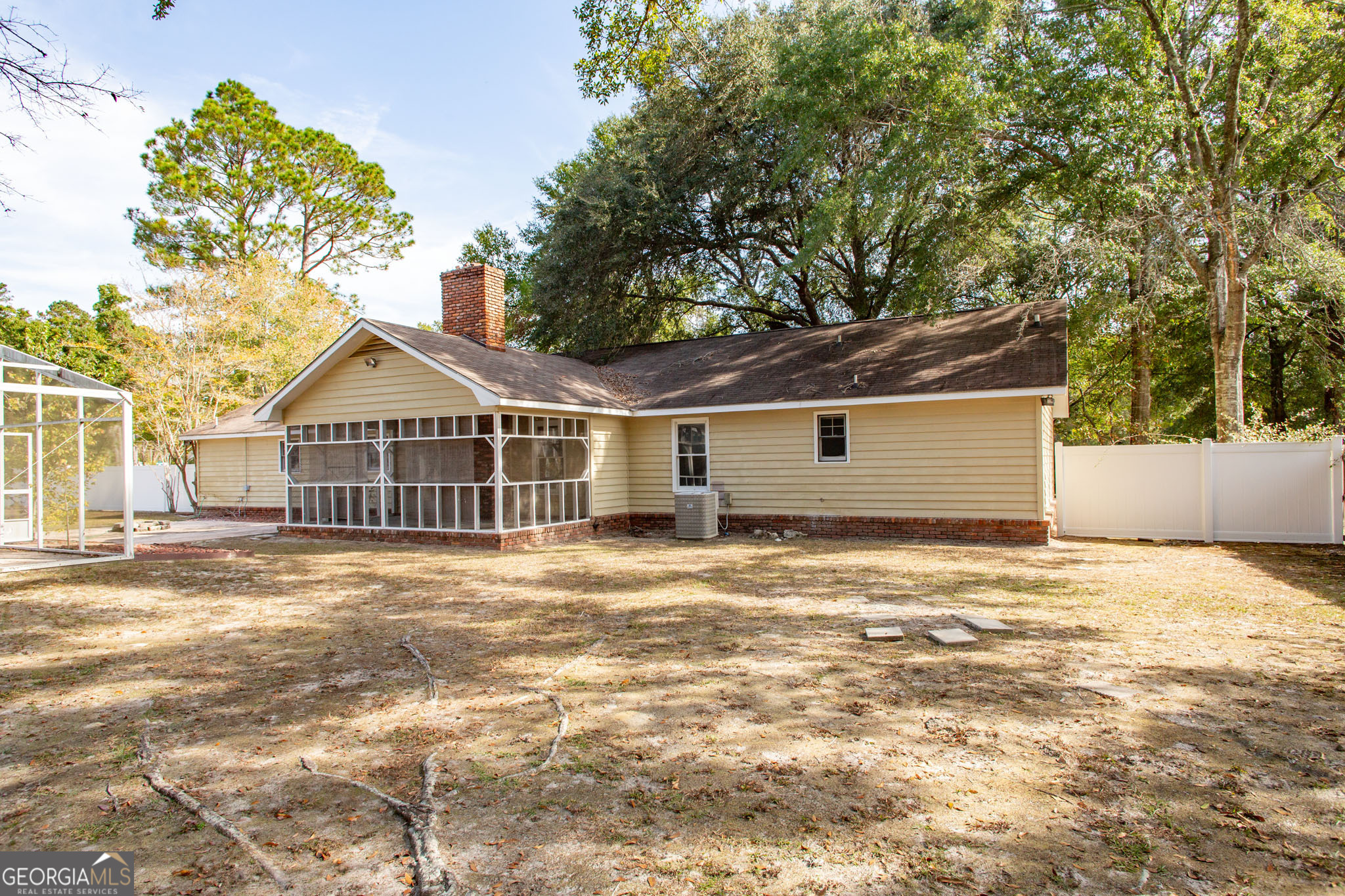 2959 Chadwick Drive Waycross, GA 31501 - Photo 14 of 52 a front view of a house with a garden