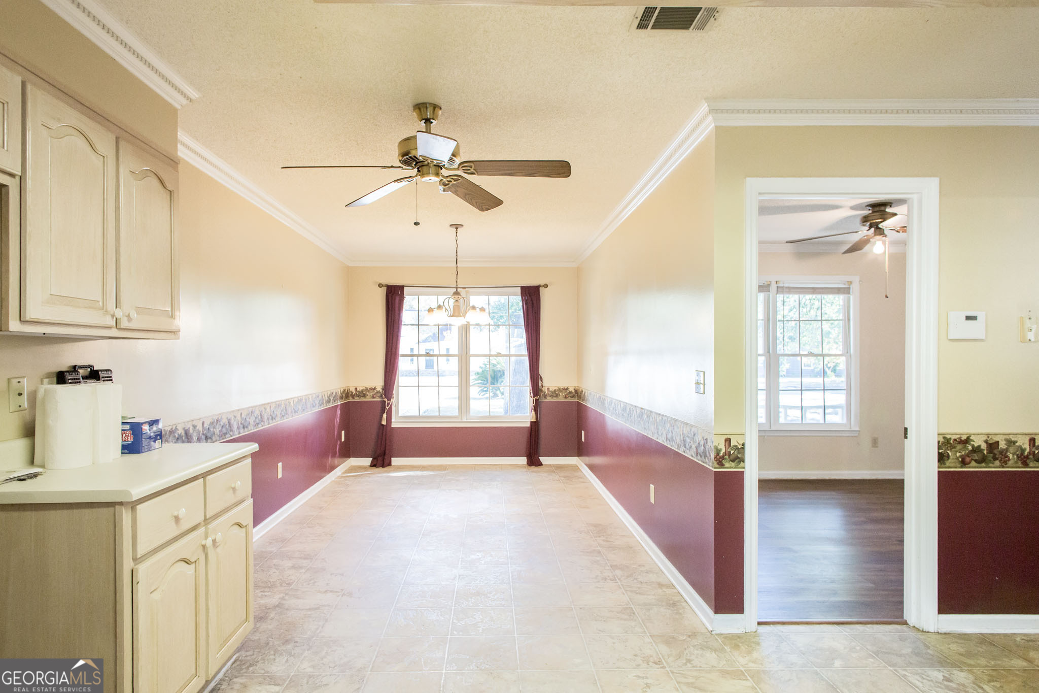 2959 Chadwick Drive Waycross, GA 31501 - Photo 27 of 52 a open kitchen with cabinets a sink and dishwasher