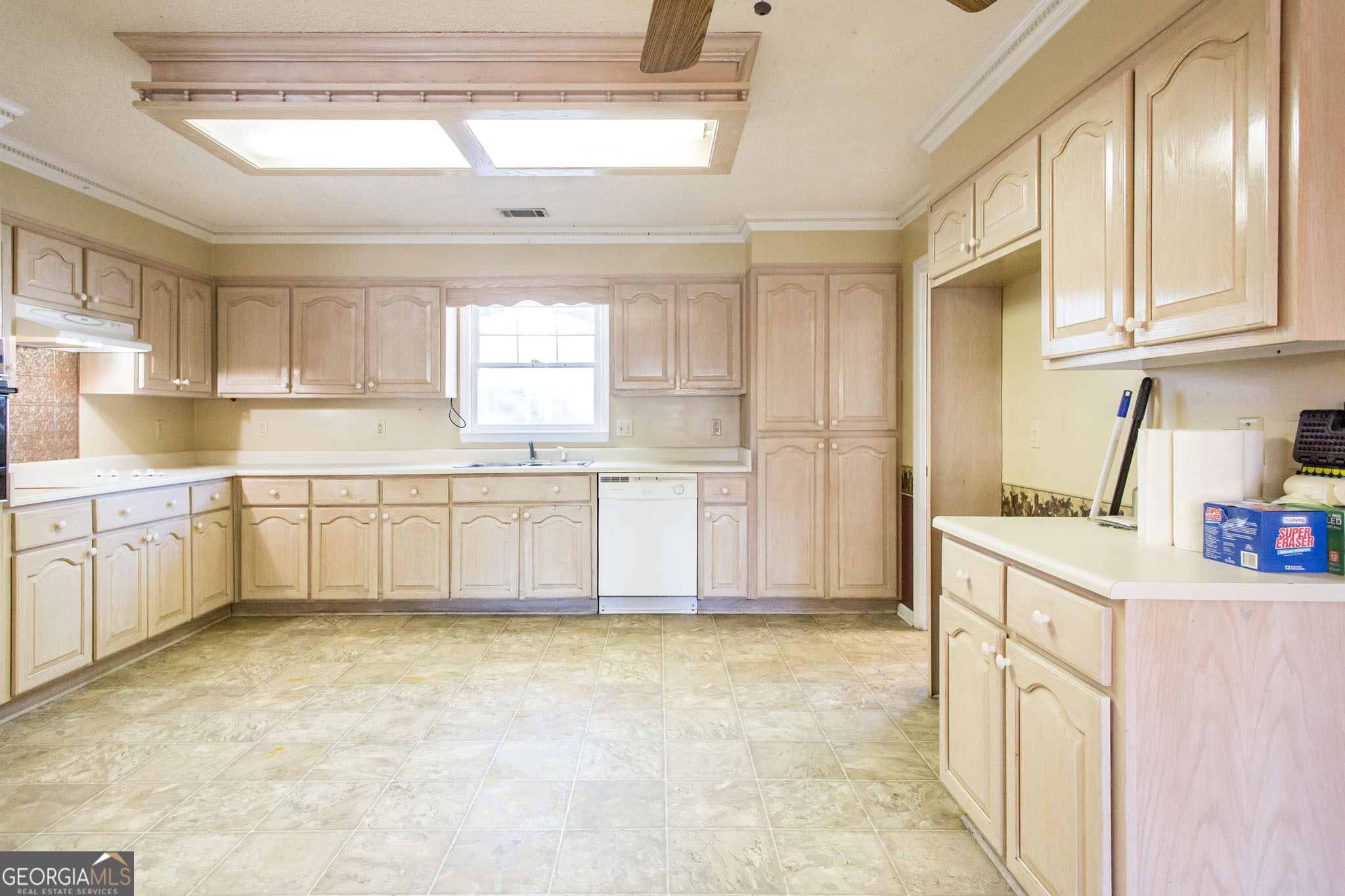 2959 Chadwick Drive Waycross, GA 31501 - Photo 28 of 52 a kitchen with stainless steel appliances granite countertop a sink and cabinets