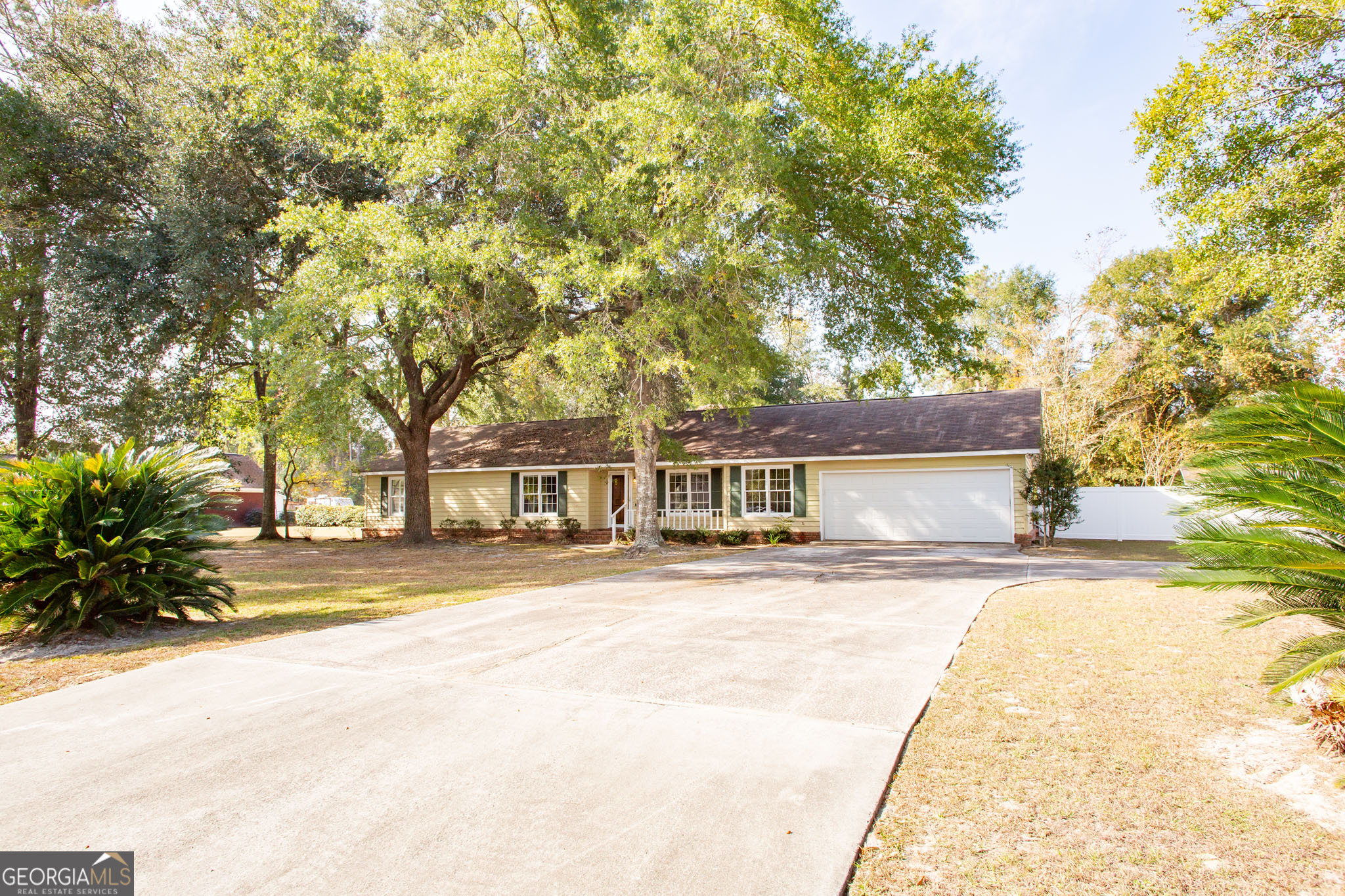 2959 Chadwick Drive Waycross, GA 31501 - Photo 3 of 52 front view of a house with a yard and an trees