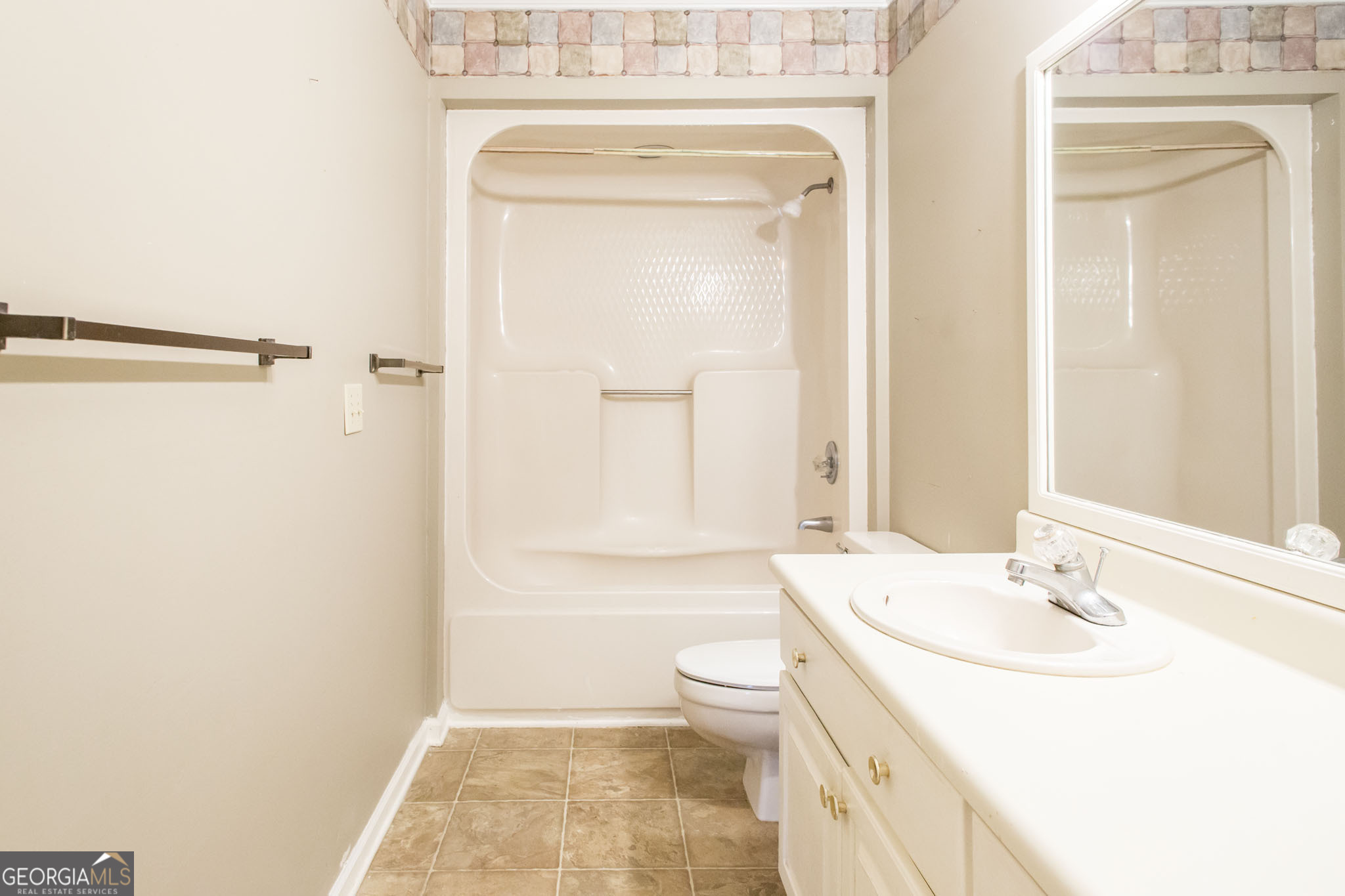 2959 Chadwick Drive Waycross, GA 31501 - Photo 42 of 52 a bathroom with a sink toilet and shower