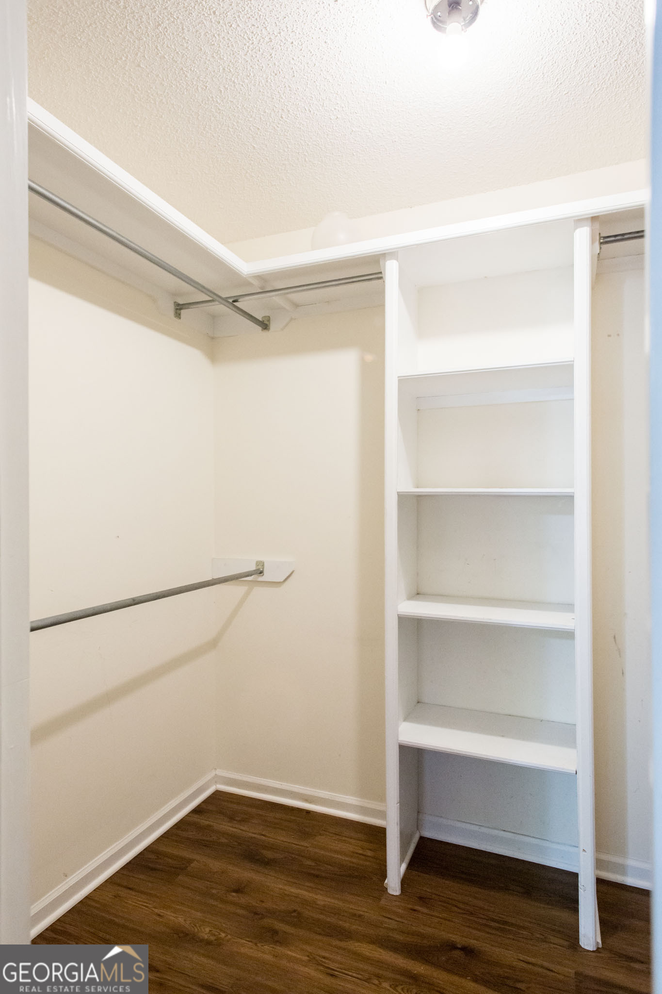 2959 Chadwick Drive Waycross, GA 31501 - Photo 46 of 52 a view of an empty walk in closet