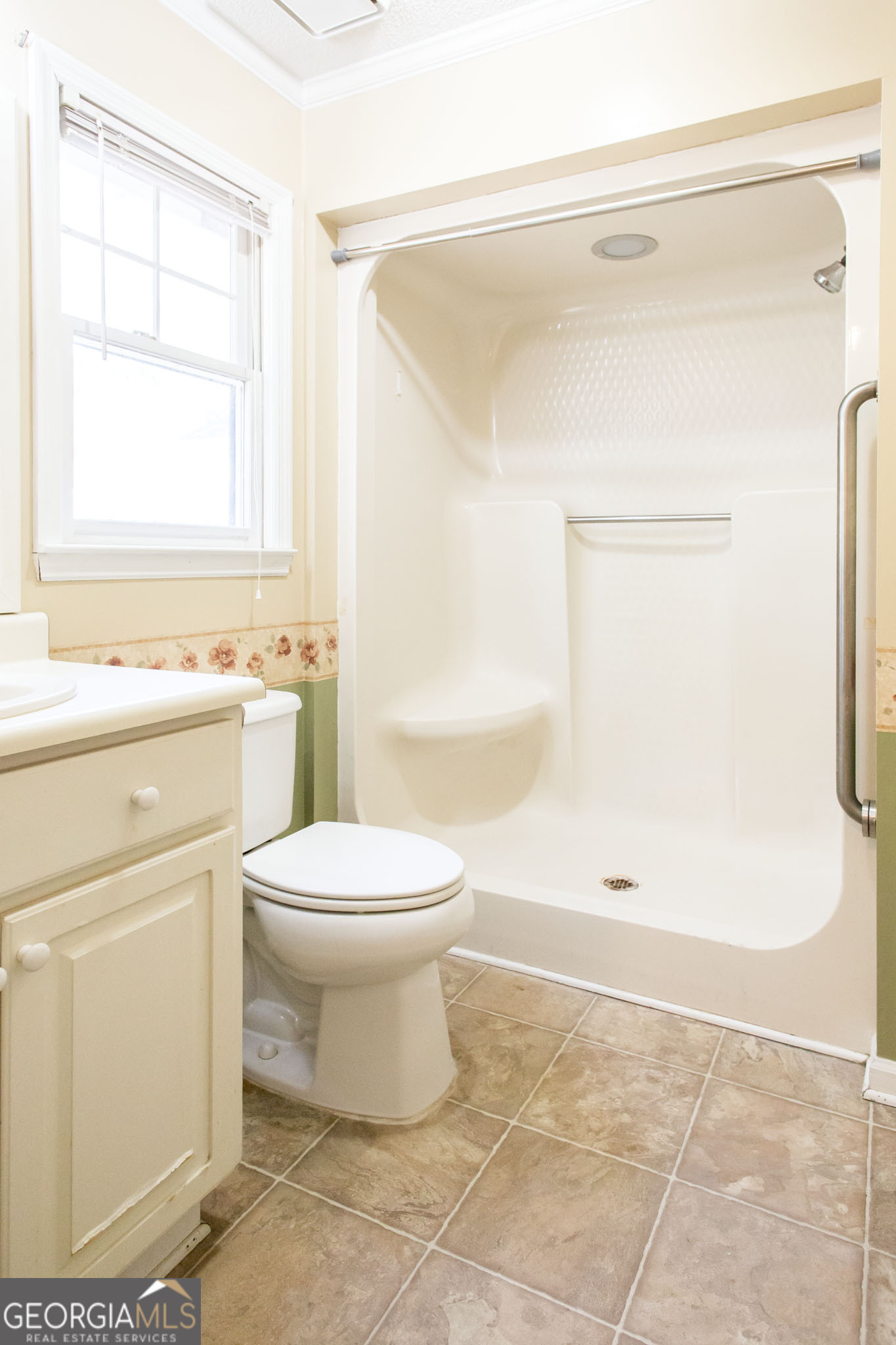 2959 Chadwick Drive Waycross, GA 31501 - Photo 51 of 52 a bathroom with a toilet a sink and a shower