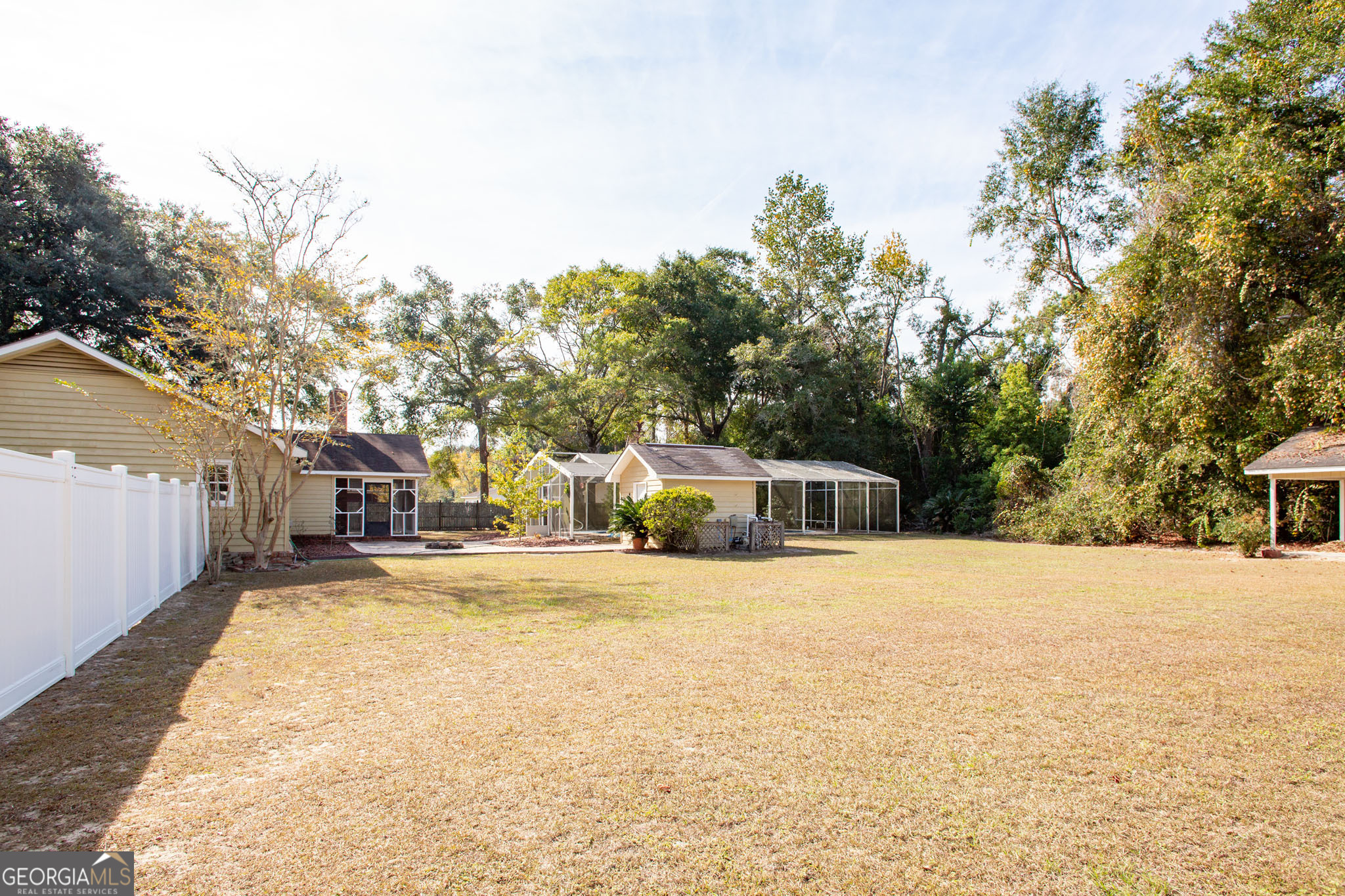 2959 Chadwick Drive Waycross, GA 31501 - Photo 7 of 52 a view of a house with a snow on the road
