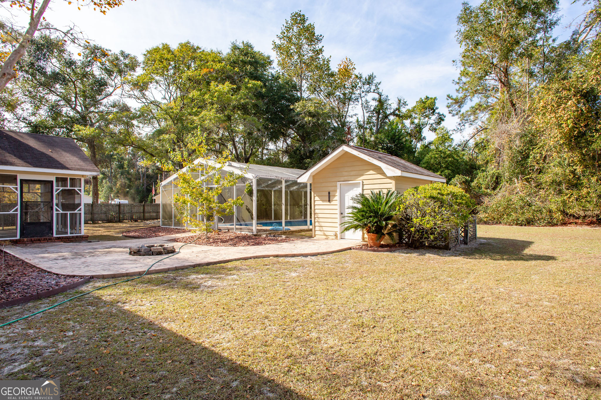2959 Chadwick Drive Waycross, GA 31501 - Photo 8 of 52 a view of a house with a yard and tree