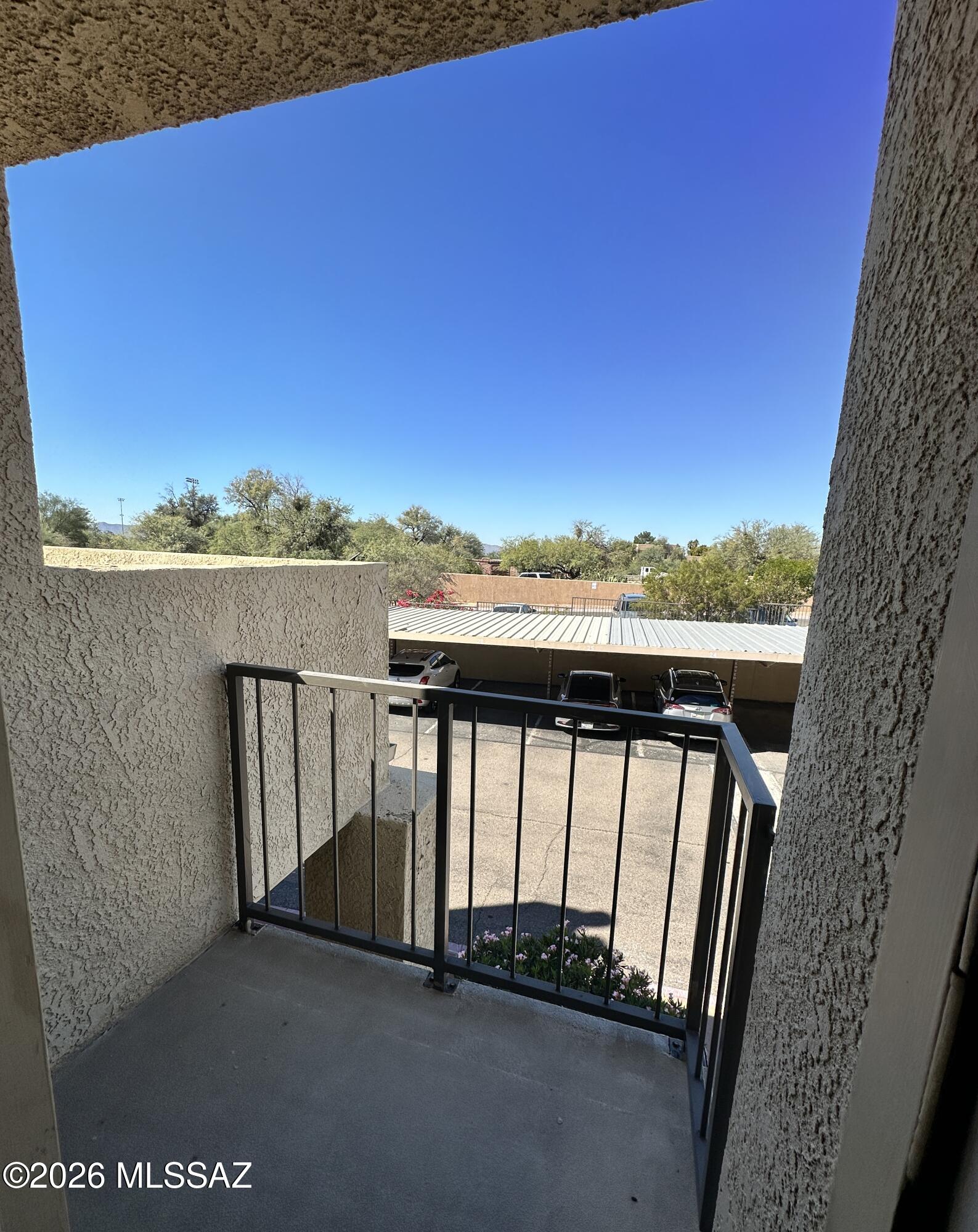 1200 East River Road, Unit F64 Tucson, AZ 85718 - Photo 23 of 23 Balcony off loft