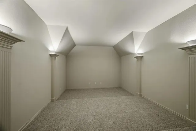 a spacious bathroom with a sink and a mirror