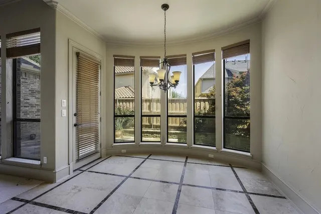 a kitchen with granite countertop cabinets stainless steel appliances a sink and a counter top space