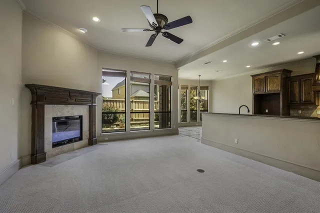 a bathroom with a granite countertop sink a light fixture and a mirror