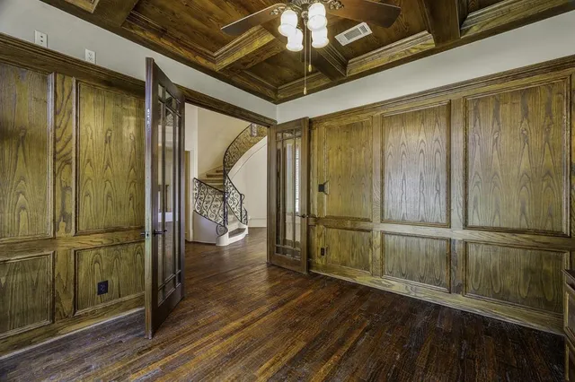 a kitchen with stainless steel appliances kitchen island granite countertop a refrigerator and a sink