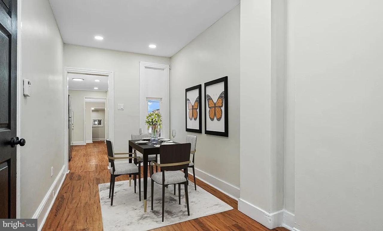 530 Maple Street Reading, PA 19602 - Photo 4 of 10 Charming hallway with butterfly art.