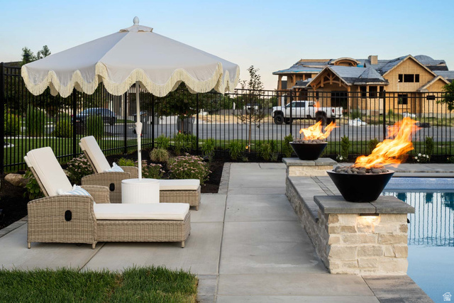 423 Eldorado Drive Mapleton, UT 84664 - Photo 6 of 40 View of patio with an outdoor fire pit