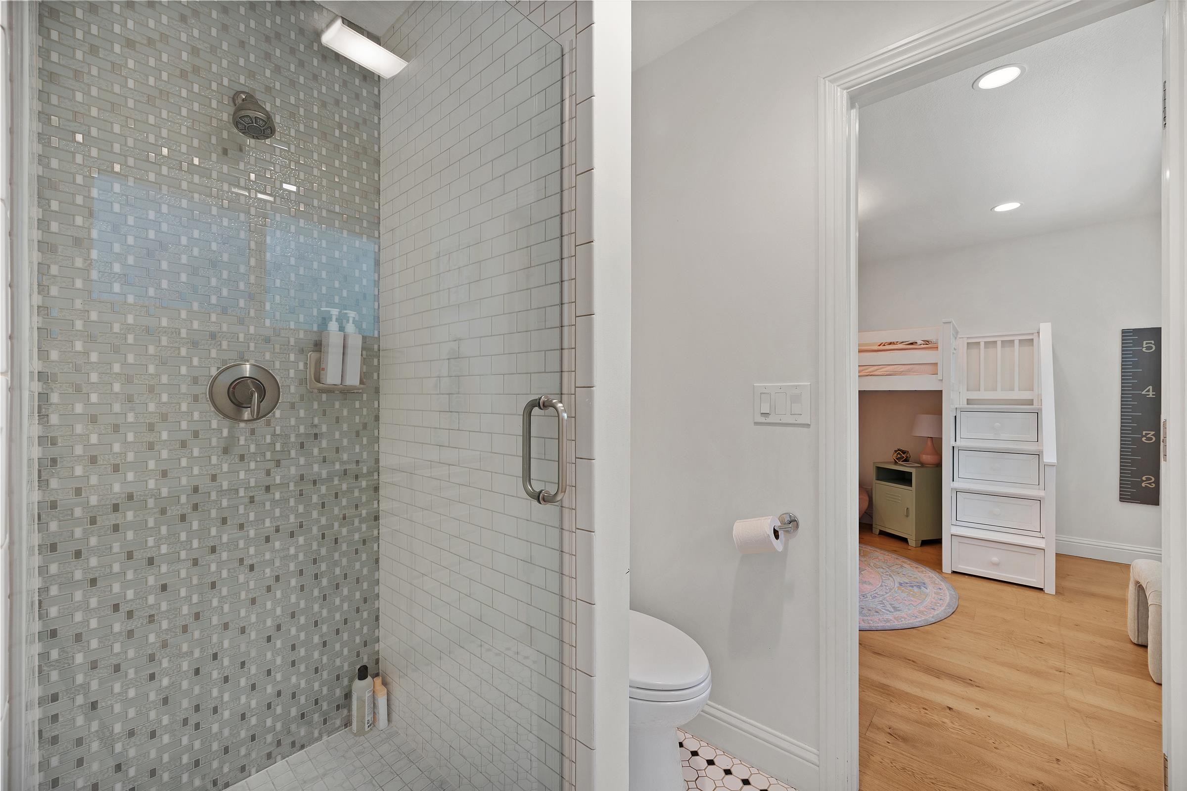 3144 Roundhill Road Alamo, CA 94507 - Photo 38 of 58 a bathroom with a granite countertop shower a toilet and a sink