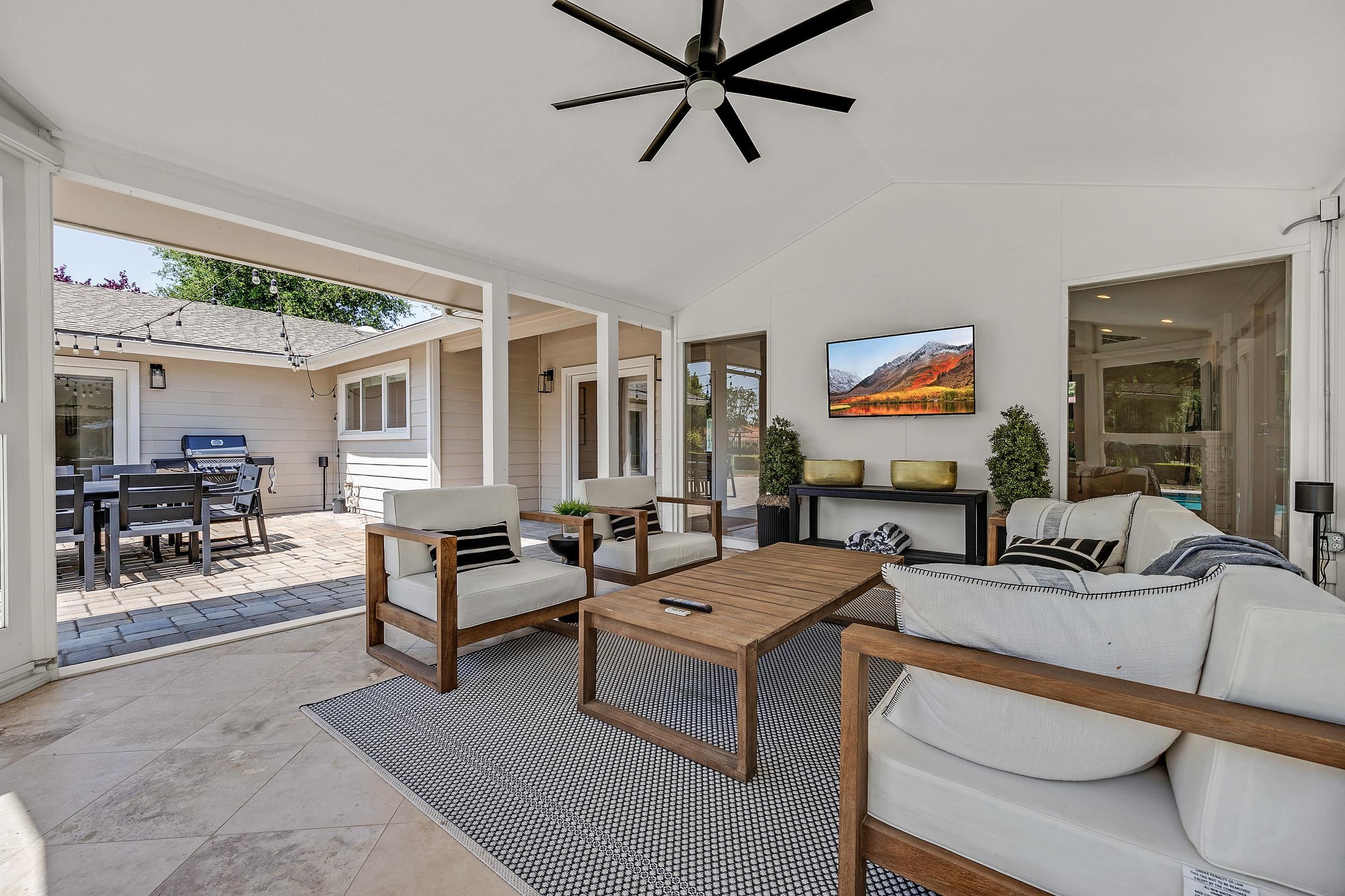 3144 Roundhill Road Alamo, CA 94507 - Photo 42 of 58 a living room with furniture and a large window