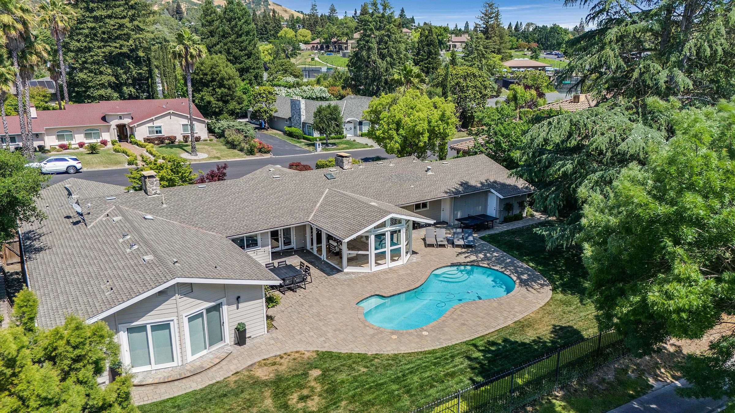 3144 Roundhill Road Alamo, CA 94507 - Photo 52 of 58 an aerial view of a house with yard swimming pool and outdoor seating
