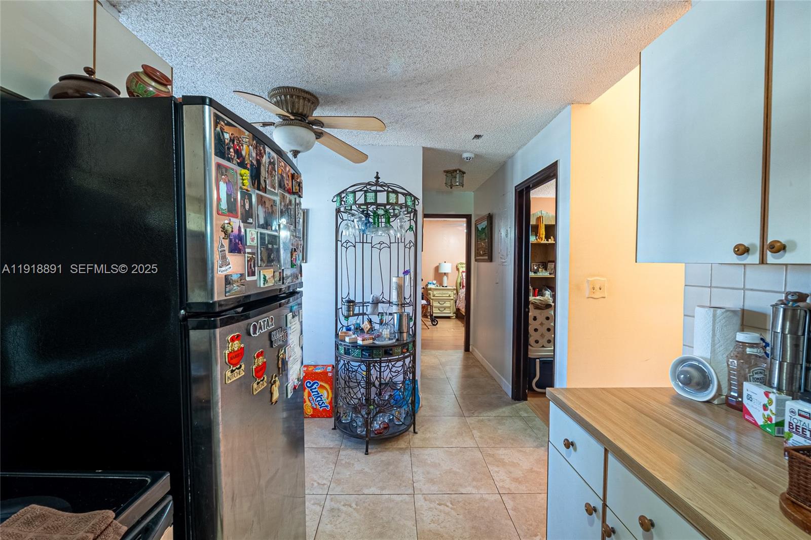 12421 Southwest 193rd Street Miami, FL 33177 - Photo 13 of 23 a view of living room with furniture and a flat screen tv