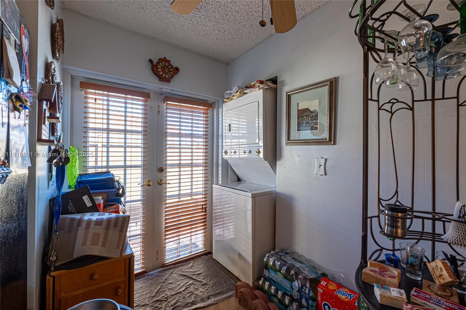 12421 Southwest 193rd Street Miami, FL 33177 - Photo 16 of 23 a room that has a bed and a plant in it