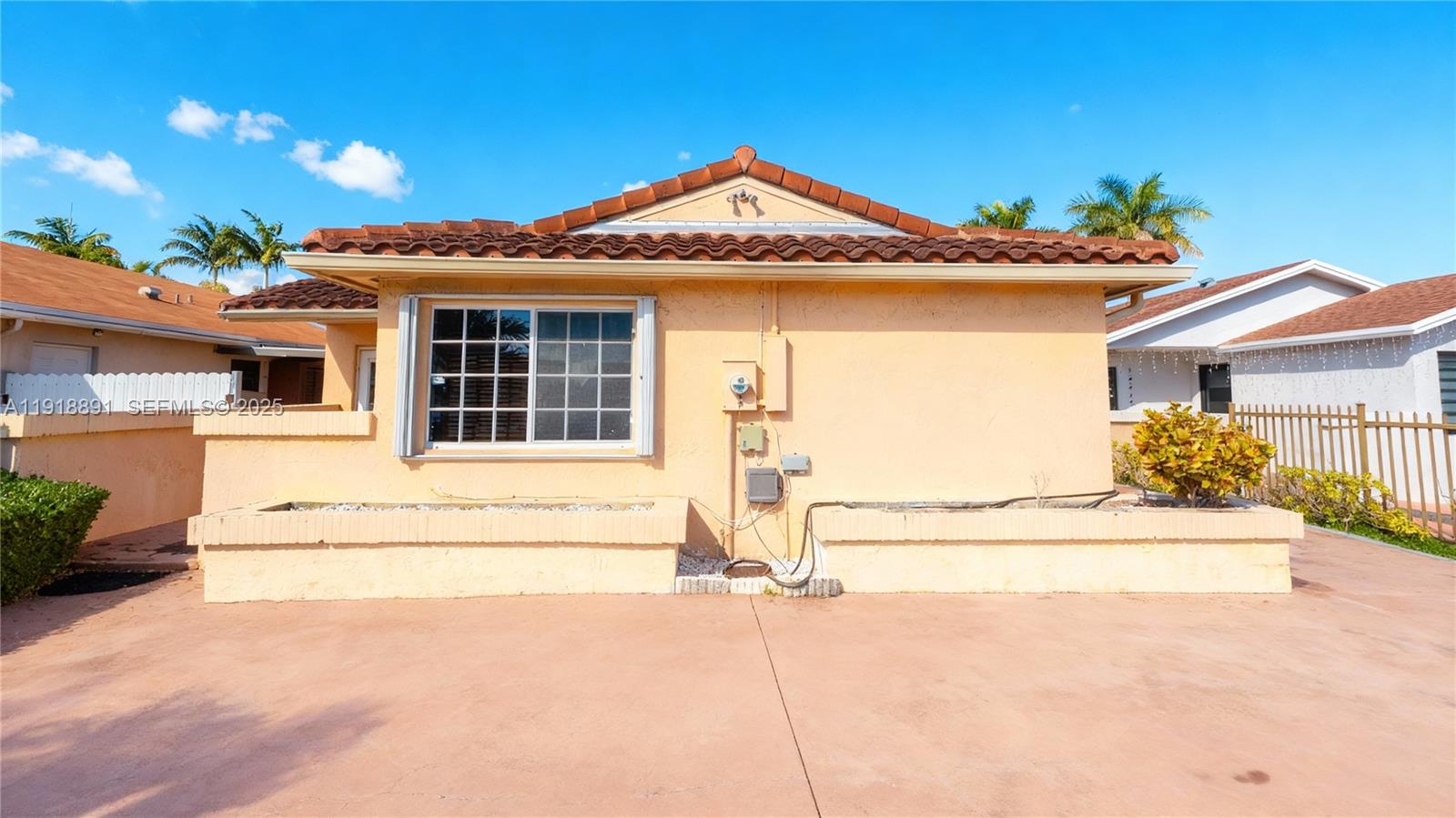 12421 Southwest 193rd Street Miami, FL 33177 - Photo 2 of 23 a house with a outdoor space