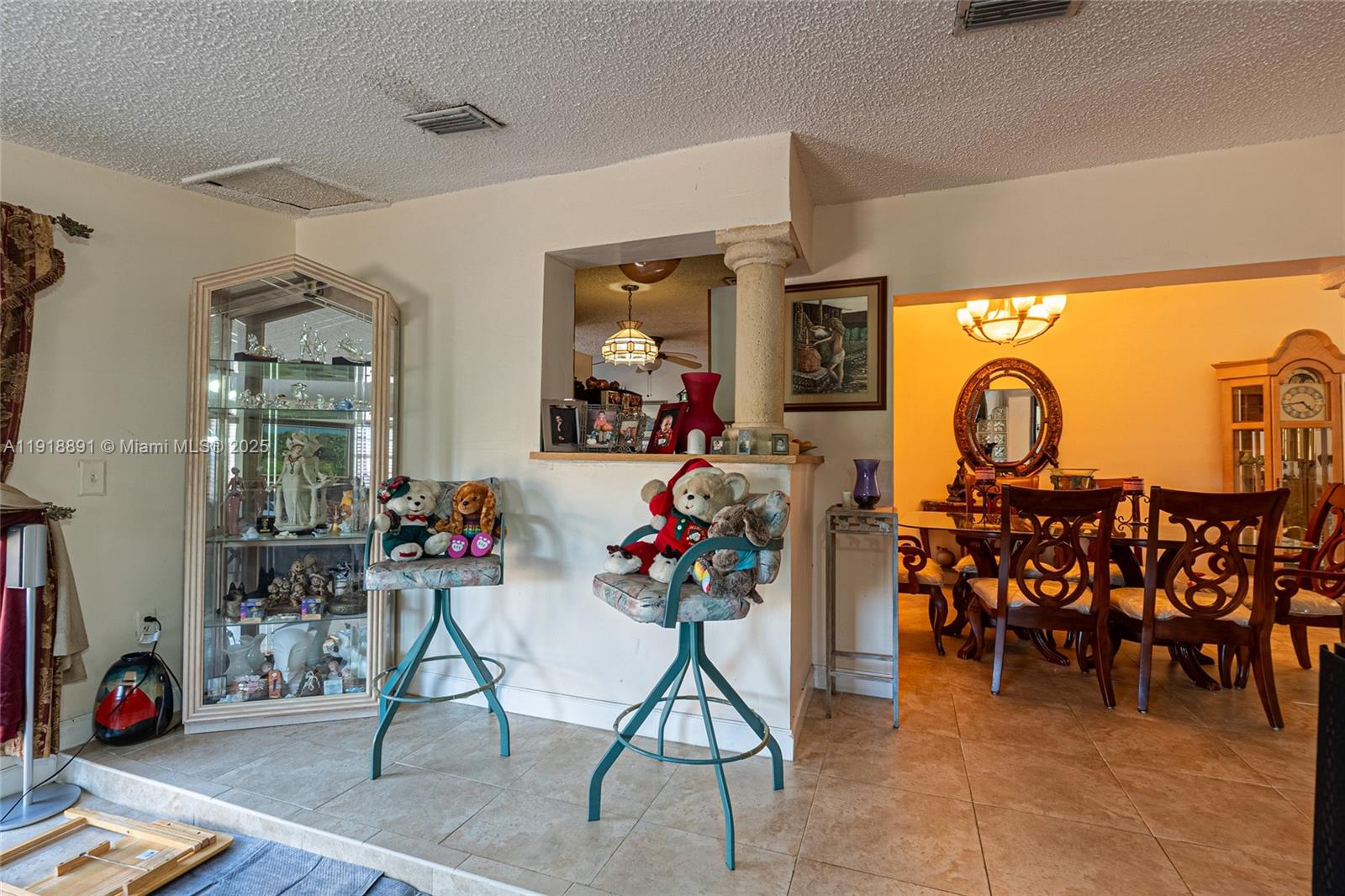 12421 Southwest 193rd Street Miami, FL 33177 - Photo 21 of 23 a view of a livingroom with furniture and a window