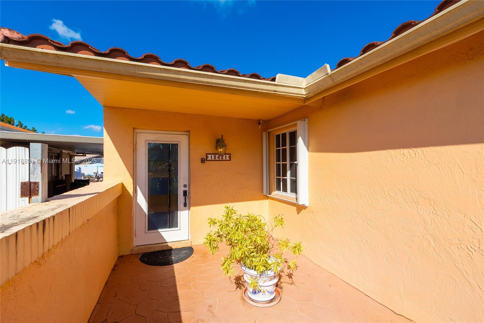 12421 Southwest 193rd Street Miami, FL 33177 - Photo 23 of 23 a view of a house with a backyard