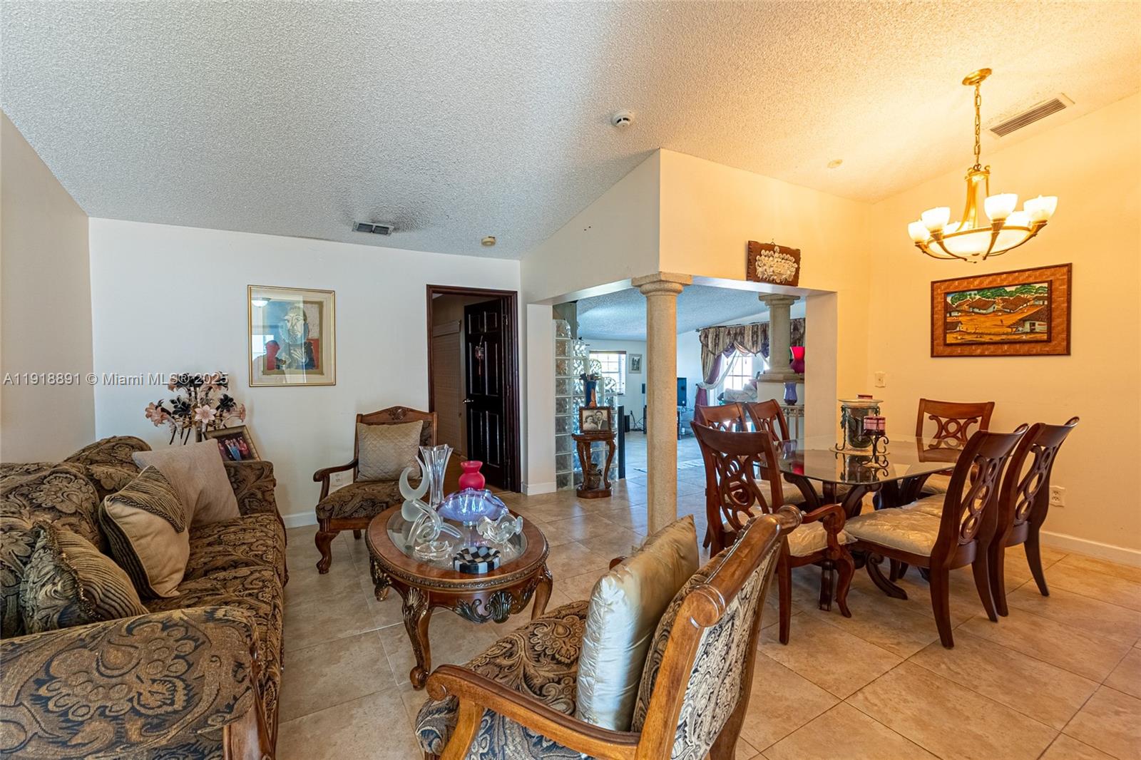 12421 Southwest 193rd Street Miami, FL 33177 - Photo 6 of 23 a view of a dining room with furniture