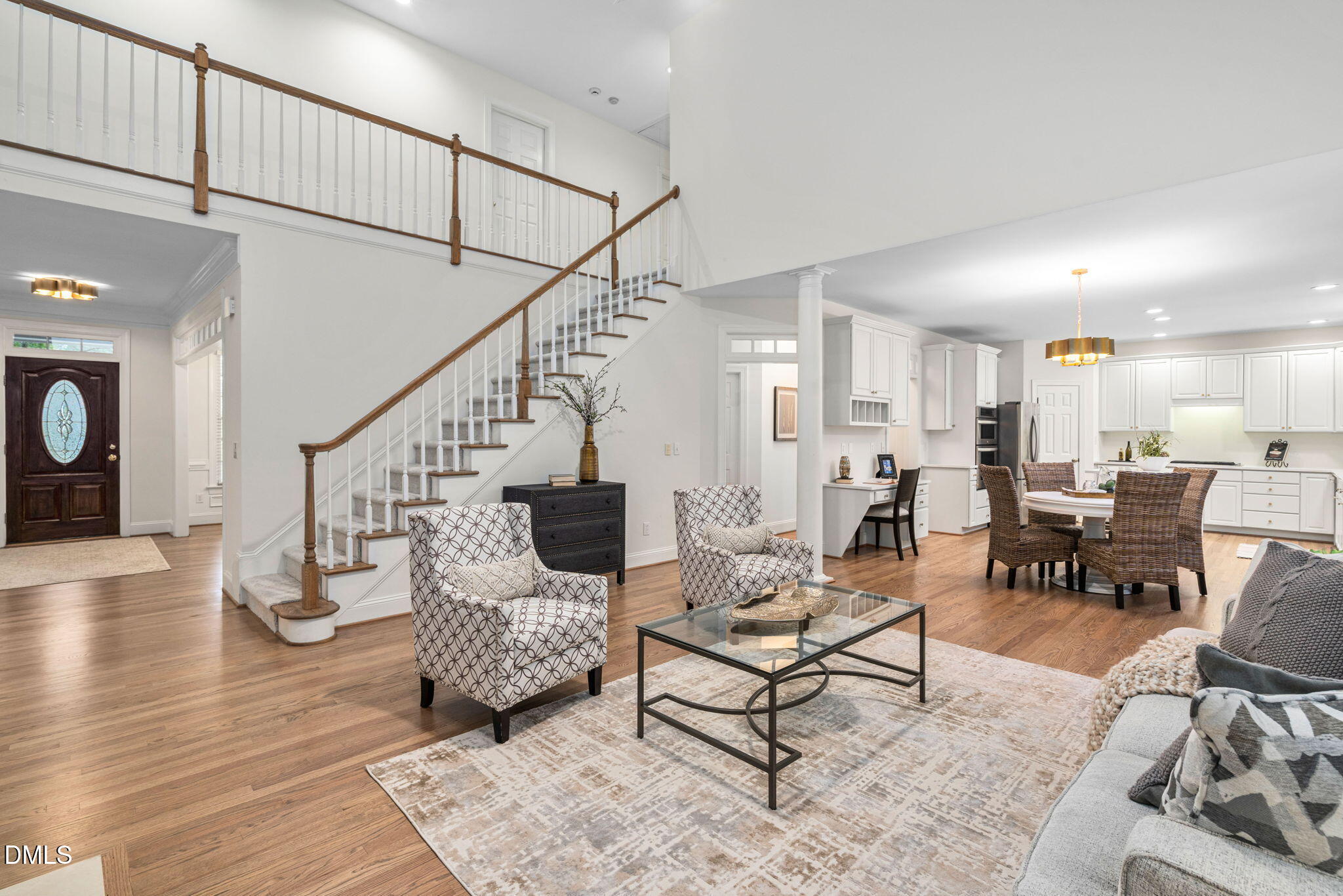 310 Hogans Valley Way Cary, NC 27513 - Photo 15 of 49 a living room with furniture and wooden floor