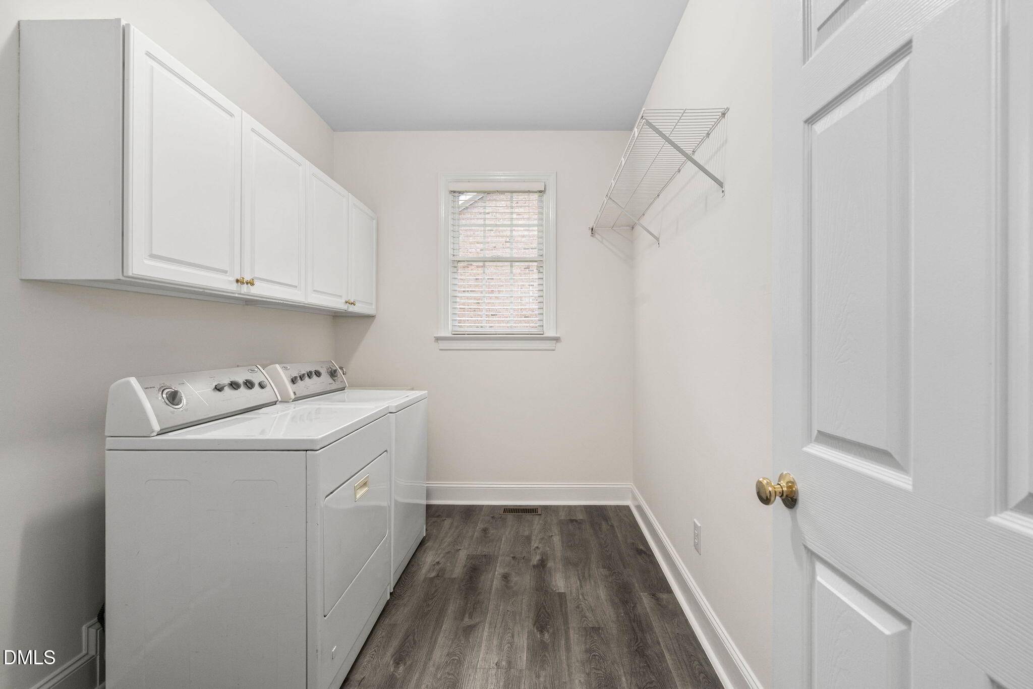 310 Hogans Valley Way Cary, NC 27513 - Photo 24 of 49 a view of a storage and utility room with washer and dryer