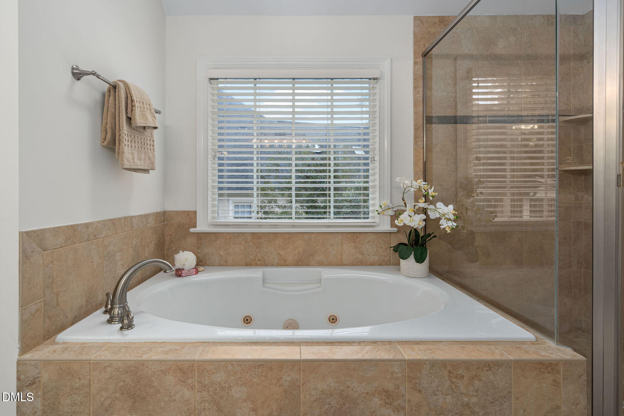 310 Hogans Valley Way Cary, NC 27513 - Photo 31 of 49 a bath tub sitting in a bathroom next to a window