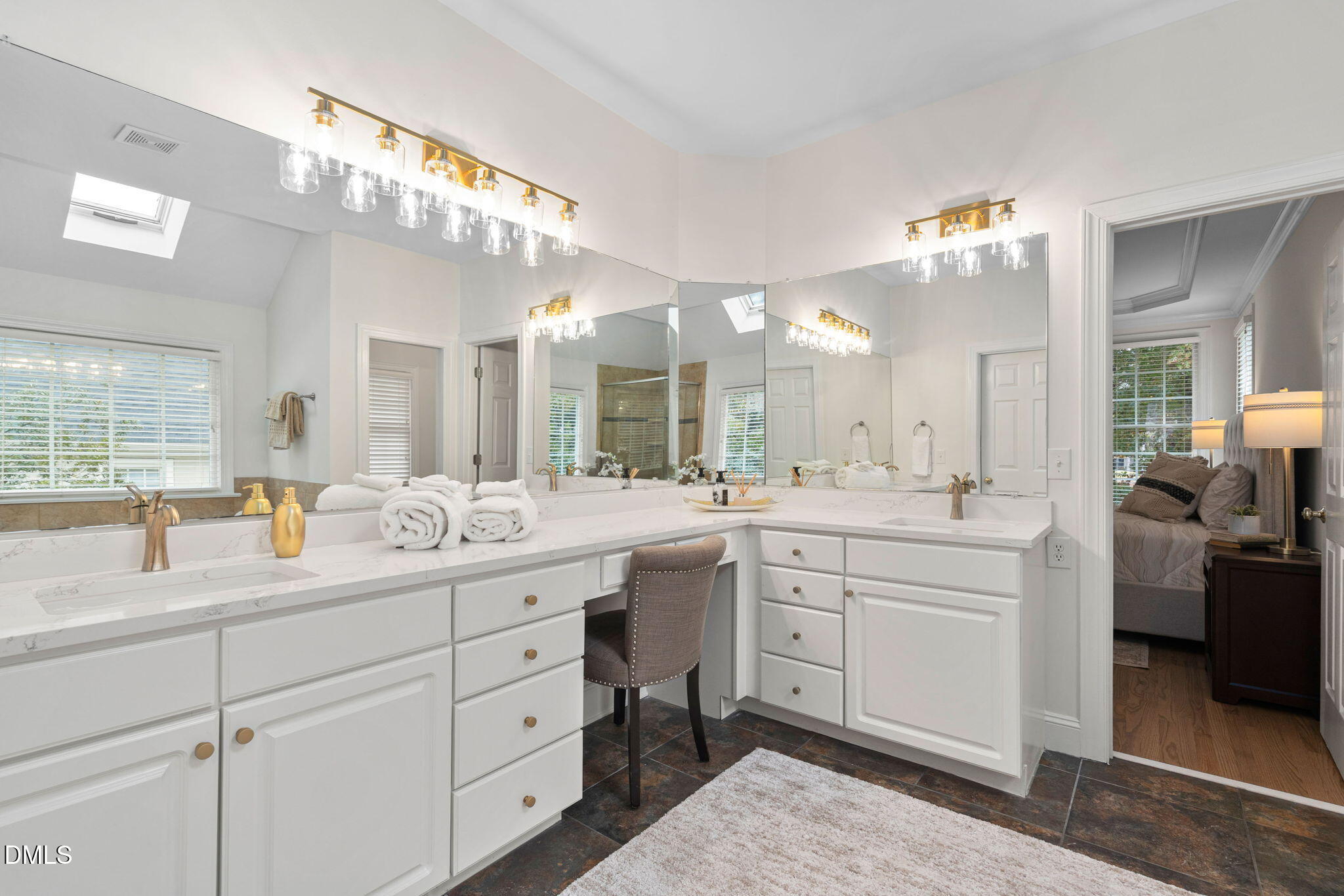310 Hogans Valley Way Cary, NC 27513 - Photo 32 of 49 a bathroom with a sink vanity and mirror