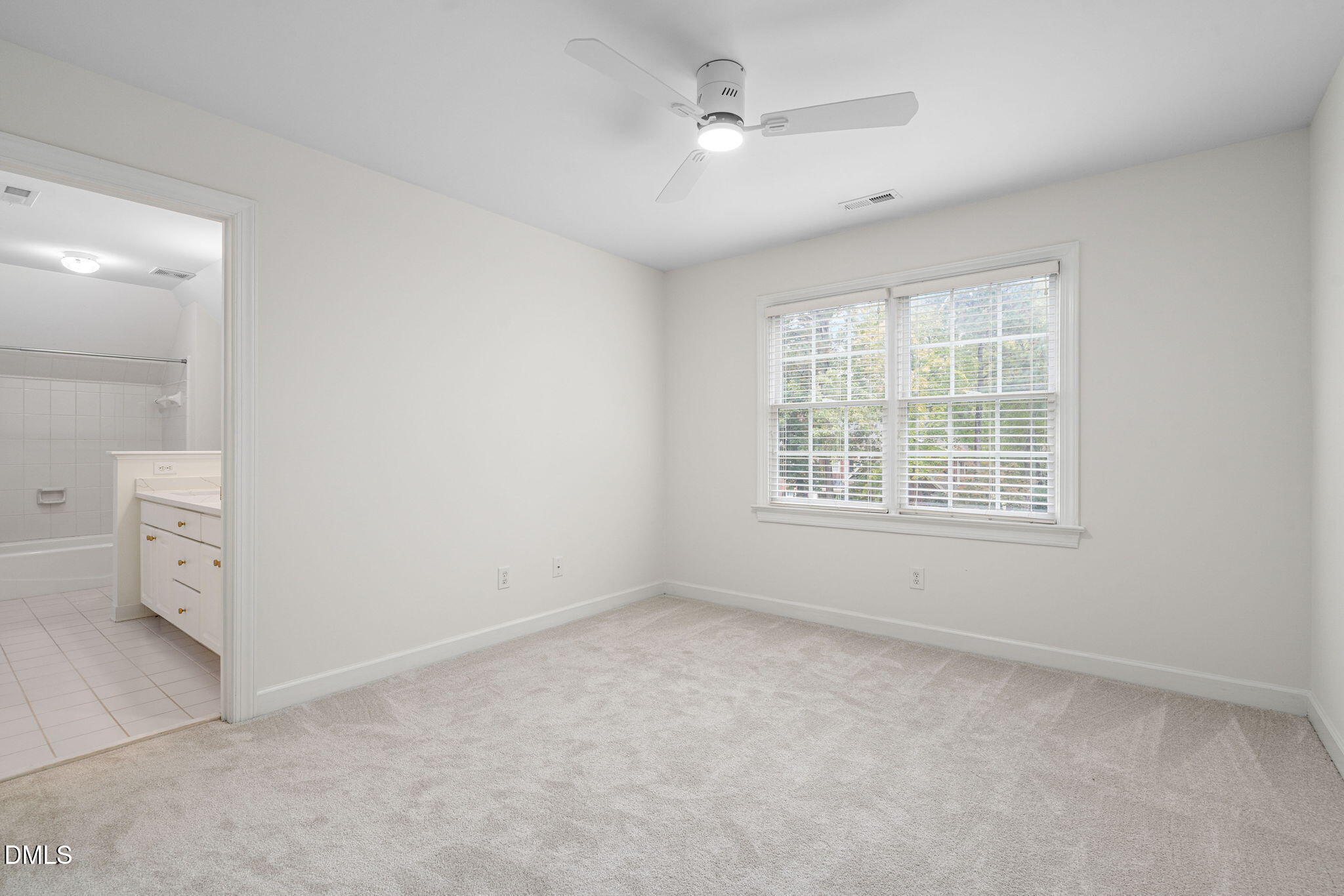 310 Hogans Valley Way Cary, NC 27513 - Photo 42 of 49 a view of an empty room with a window
