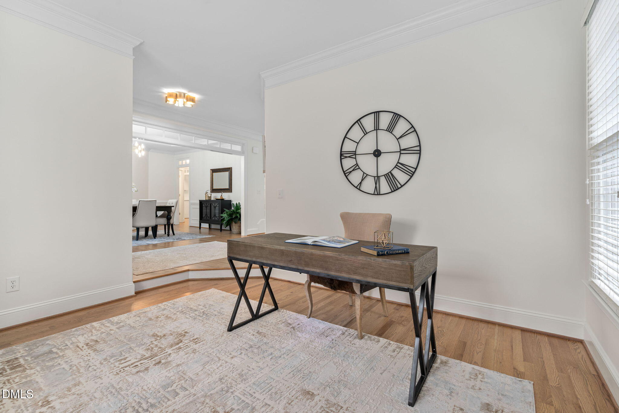 310 Hogans Valley Way Cary, NC 27513 - Photo 8 of 49 a view of a work space with furniture and wooden floor