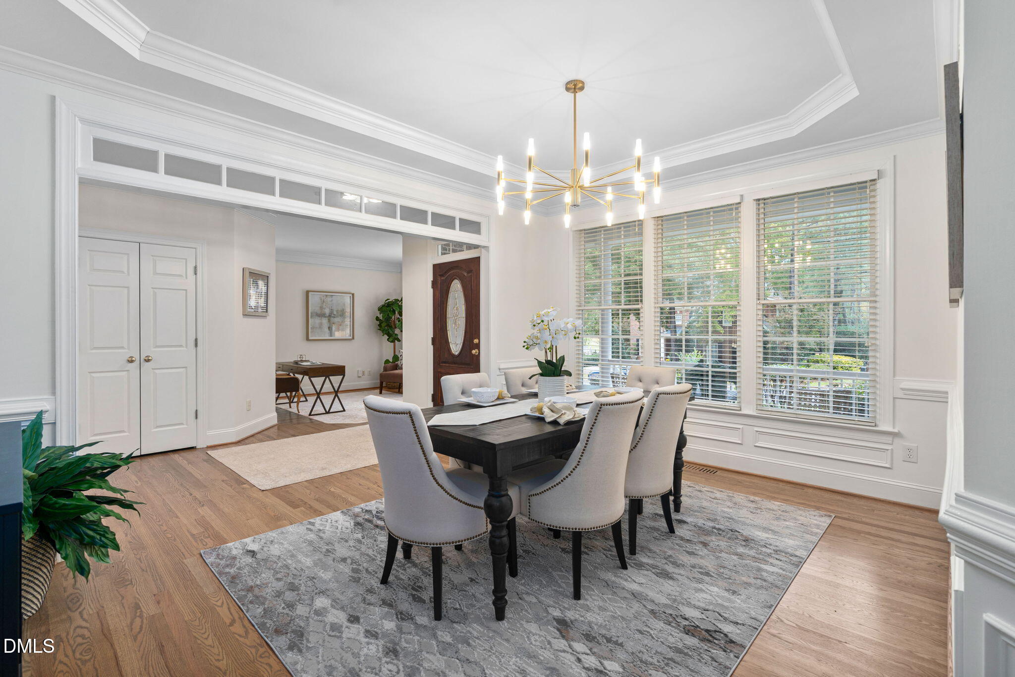 310 Hogans Valley Way Cary, NC 27513 - Photo 9 of 49 a view of a dining room with furniture window and wooden floor