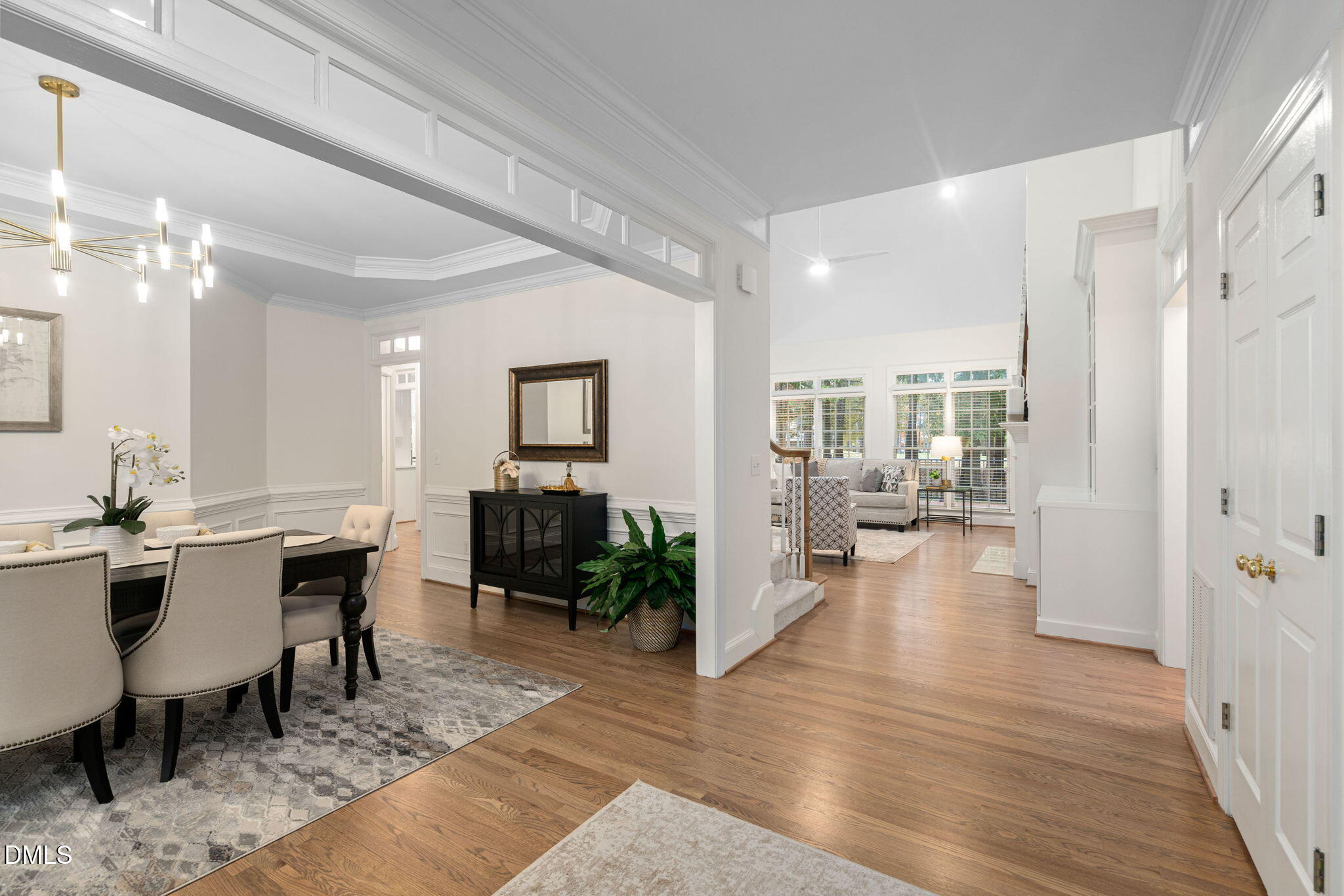 310 Hogans Valley Way Cary, NC 27513 - Photo 10 of 49 a view of a dining room with furniture window and wooden floor