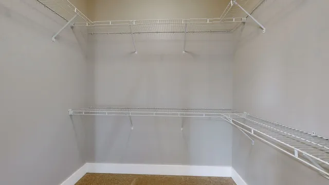 a view of a room with racks on the wall