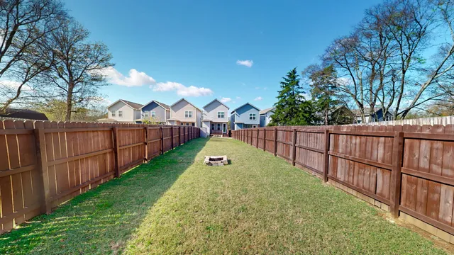 a view of balcony with wooden floor