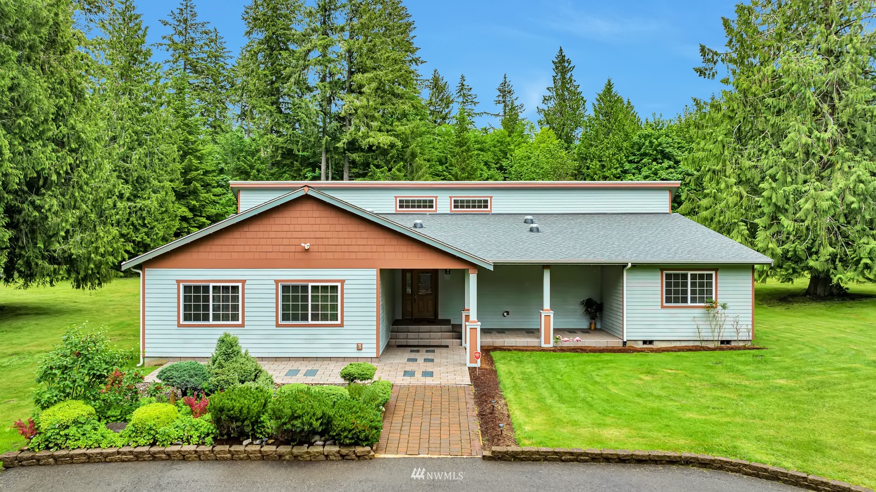 8541 58th Avenue Southeast Olympia, WA 98513 - Photo 1 of 36 a house view with a garden space
