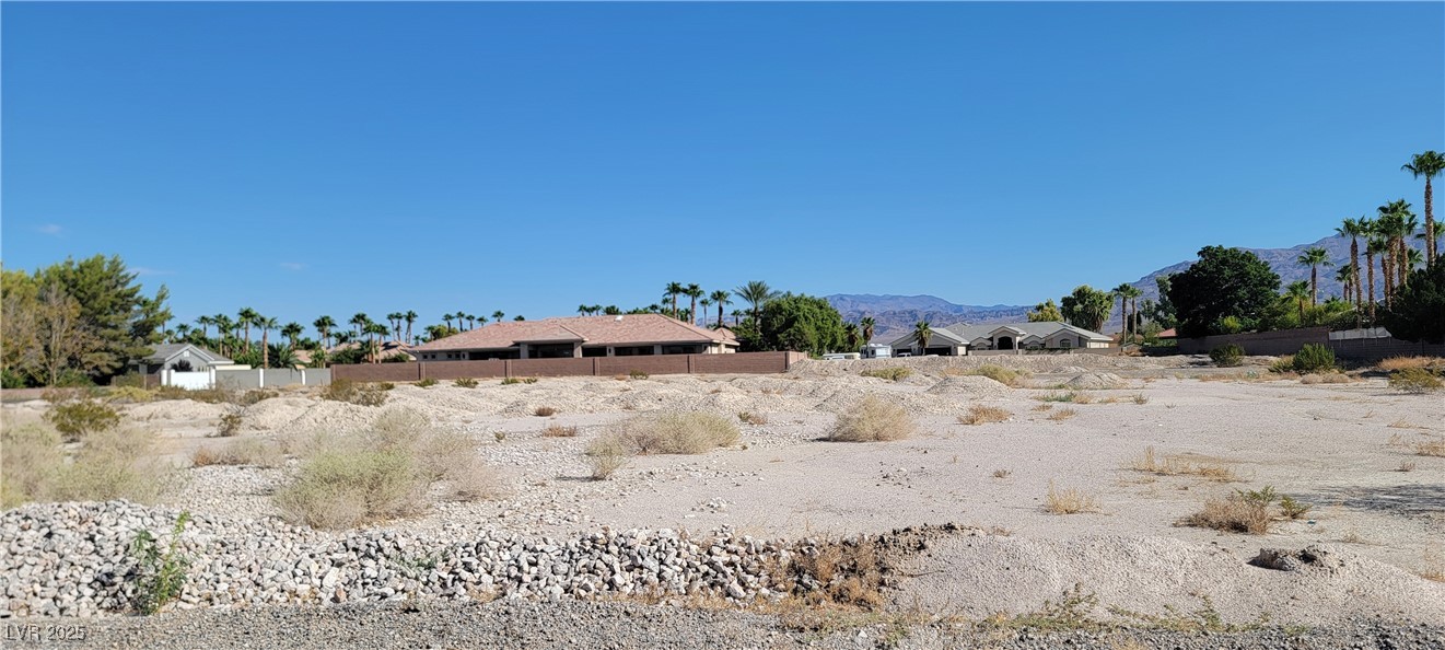 7026 Farm Road Las Vegas, NV 89131 - Photo 3 of 7 View of yard featuring a mountain view