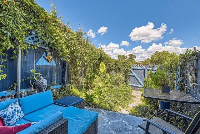 a view of a porch with furniture