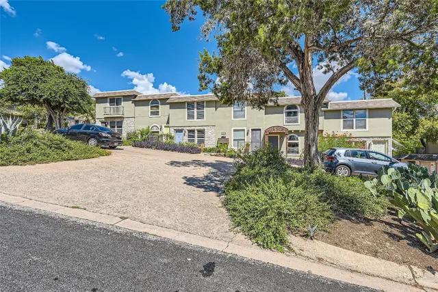 an aerial view of a city with lots of residential buildings