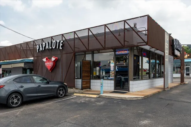 a car parked in front of a house