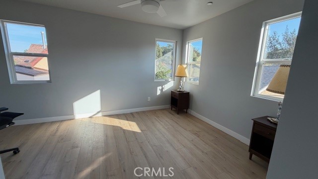 2413 La Crescenta Avenue, Unit A Alhambra, CA 91803 - Photo 7 of 11 a view of empty room with wooden floor and fan