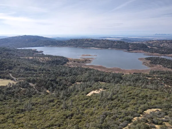 an aerial view of valley and mountain view