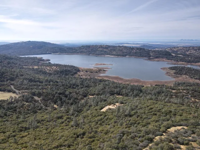 an aerial view of valley and mountain view