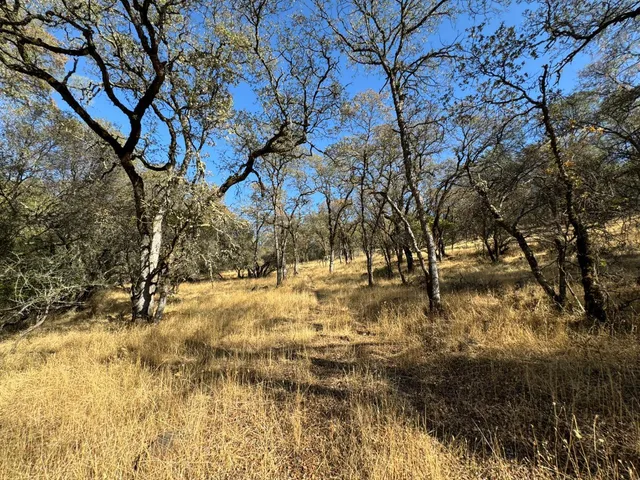 a view of white pool with a yard