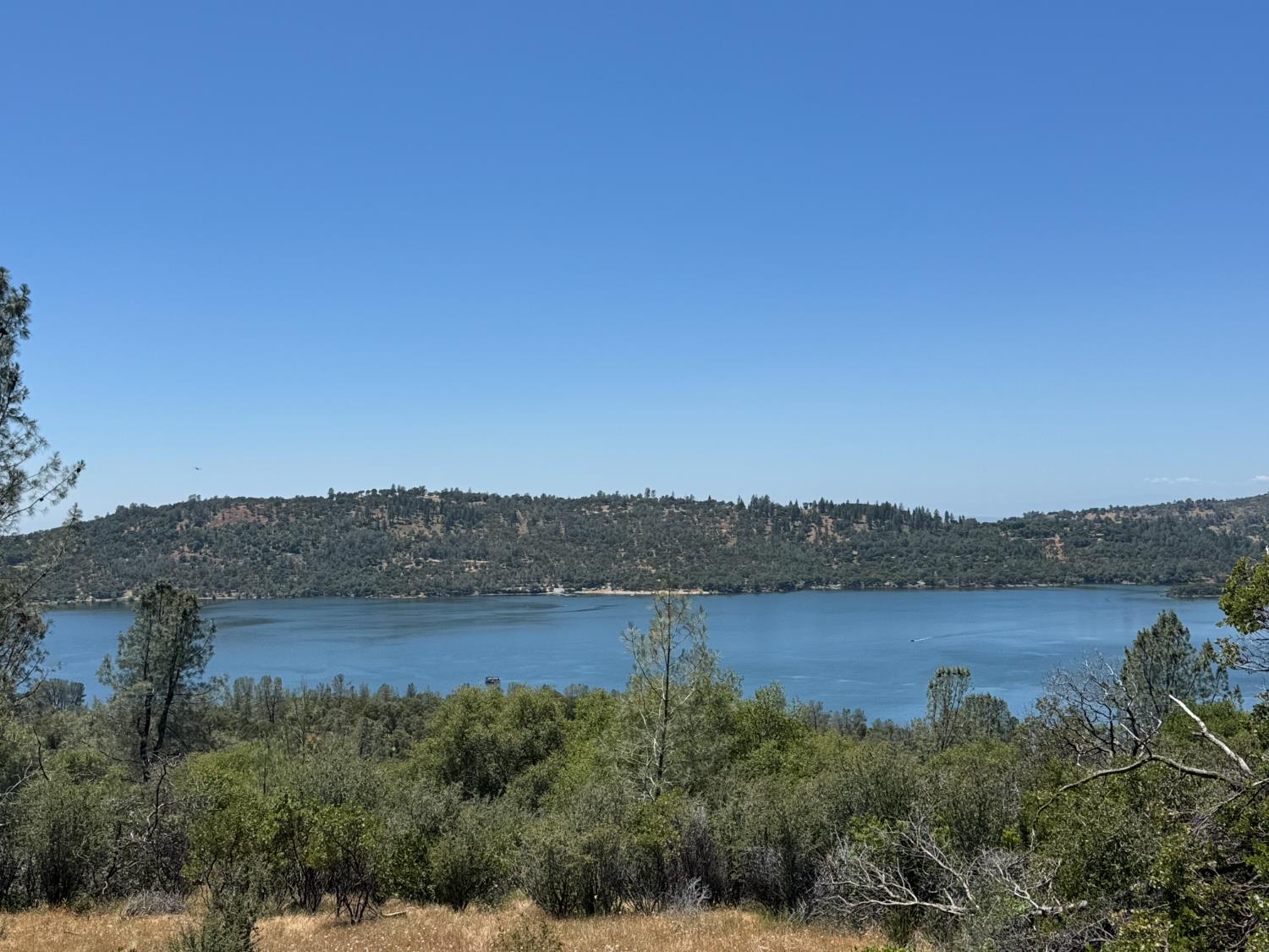 0 County Road Oregon House, CA 95962 - Photo 2 of 38 a view of a lake with mountain in the background